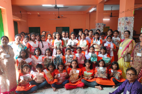 DISTRIBUTION OF NEW DRESS TO THE ORPHANS